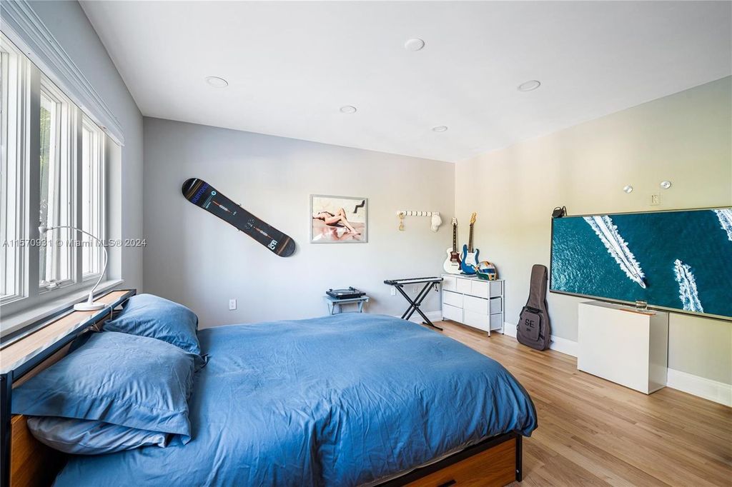 This fully renovated 7-bed, 5.5-bath masterpiece boasts stunning sunset views, a modern floor plan ideal for entertaining, and a sparkling pool with LED lighting.