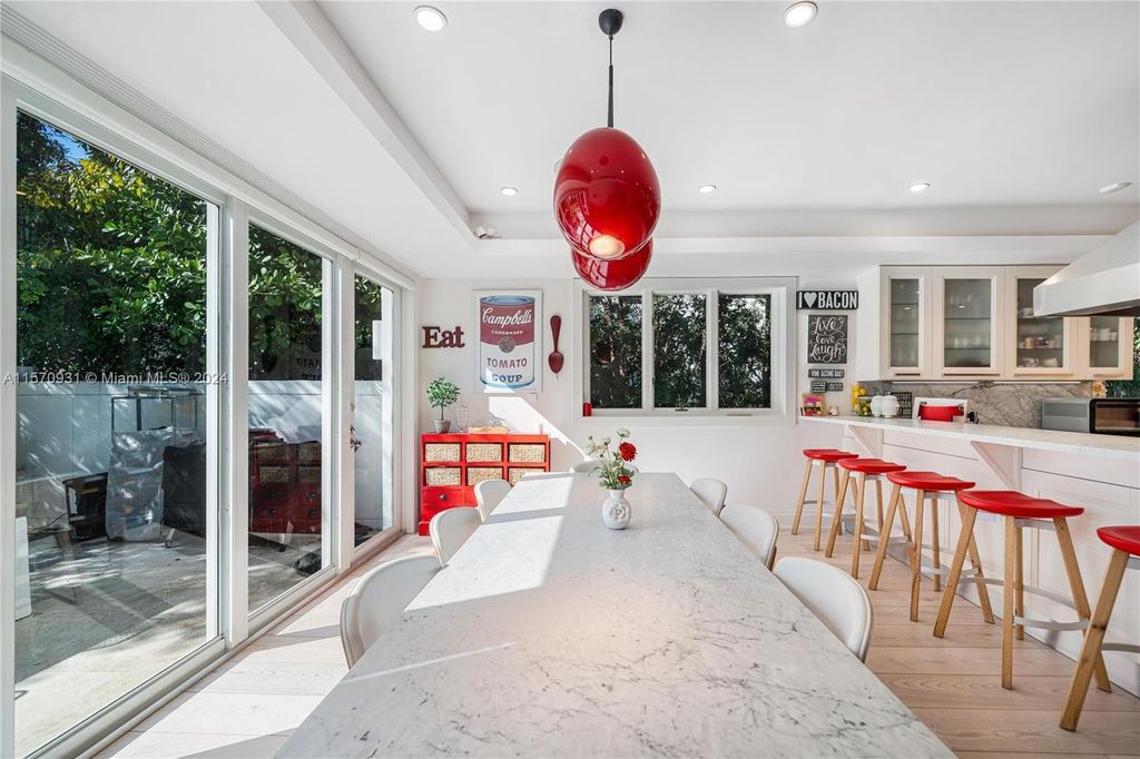 This fully renovated 7-bed, 5.5-bath masterpiece boasts stunning sunset views, a modern floor plan ideal for entertaining, and a sparkling pool with LED lighting.