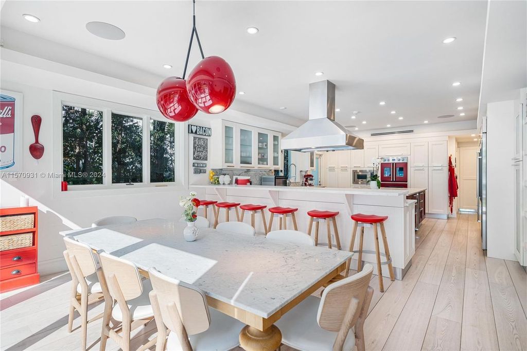 This fully renovated 7-bed, 5.5-bath masterpiece boasts stunning sunset views, a modern floor plan ideal for entertaining, and a sparkling pool with LED lighting.