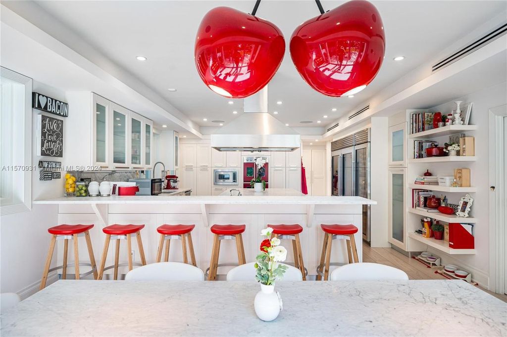 This fully renovated 7-bed, 5.5-bath masterpiece boasts stunning sunset views, a modern floor plan ideal for entertaining, and a sparkling pool with LED lighting.