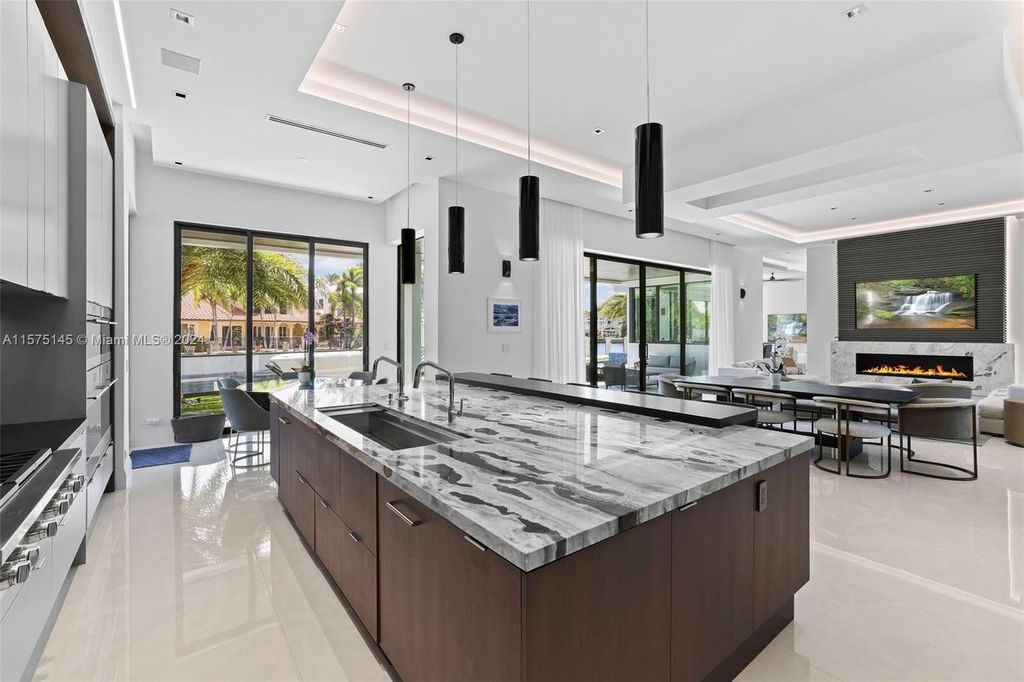 Experience luxury living at 749 Bamboo Drive. This 6 bed, 8 bath contemporary masterpiece offers 7,502 sqft of elegance, gourmet kitchen, private pool and ocean access in prestigious South Florida. Fully furnished.