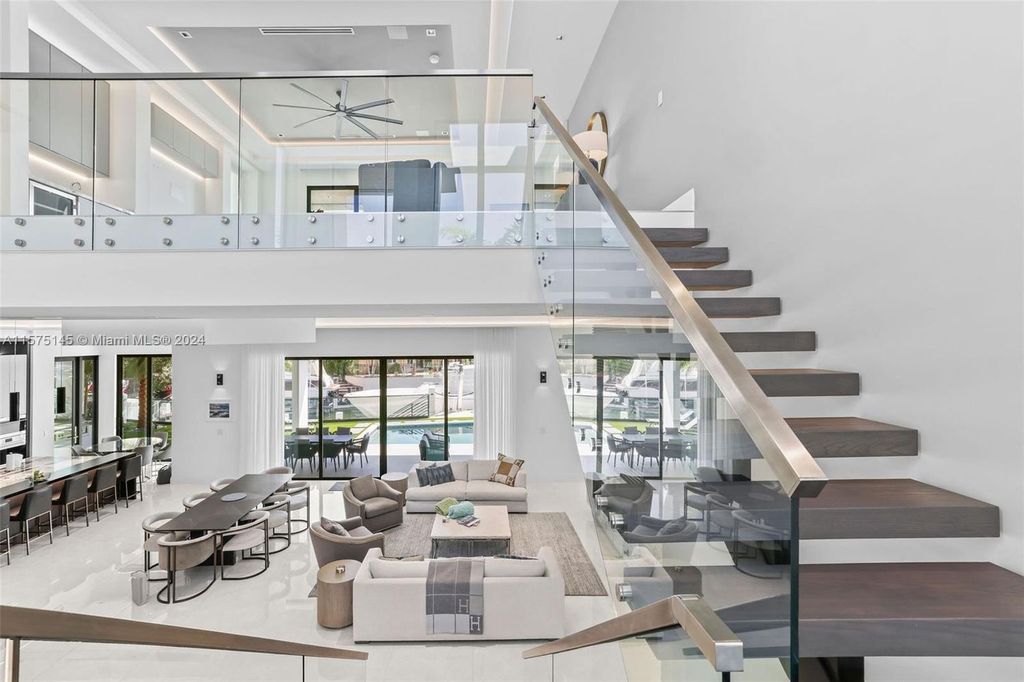 Experience luxury living at 749 Bamboo Drive. This 6 bed, 8 bath contemporary masterpiece offers 7,502 sqft of elegance, gourmet kitchen, private pool and ocean access in prestigious South Florida. Fully furnished.