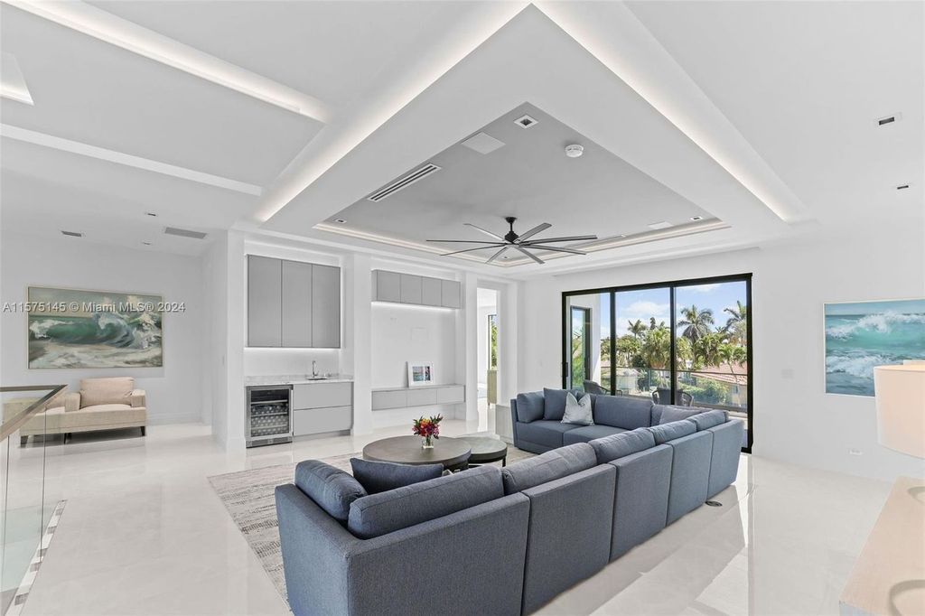 Experience luxury living at 749 Bamboo Drive. This 6 bed, 8 bath contemporary masterpiece offers 7,502 sqft of elegance, gourmet kitchen, private pool and ocean access in prestigious South Florida. Fully furnished.