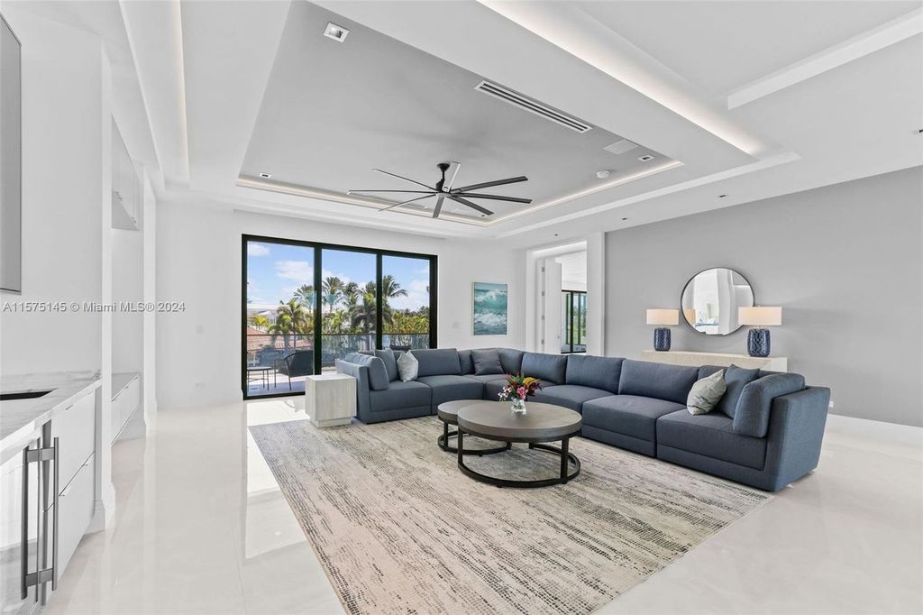 Experience luxury living at 749 Bamboo Drive. This 6 bed, 8 bath contemporary masterpiece offers 7,502 sqft of elegance, gourmet kitchen, private pool and ocean access in prestigious South Florida. Fully furnished.