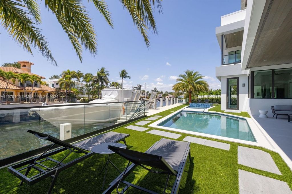 Experience luxury living at 749 Bamboo Drive. This 6 bed, 8 bath contemporary masterpiece offers 7,502 sqft of elegance, gourmet kitchen, private pool and ocean access in prestigious South Florida. Fully furnished.