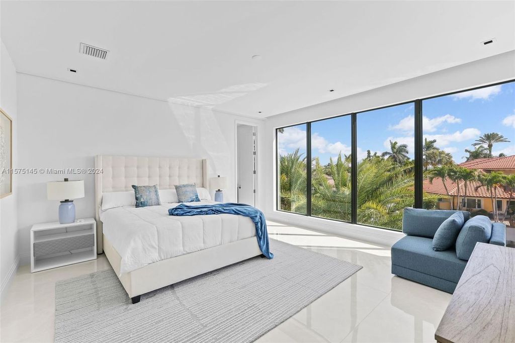 Experience luxury living at 749 Bamboo Drive. This 6 bed, 8 bath contemporary masterpiece offers 7,502 sqft of elegance, gourmet kitchen, private pool and ocean access in prestigious South Florida. Fully furnished.