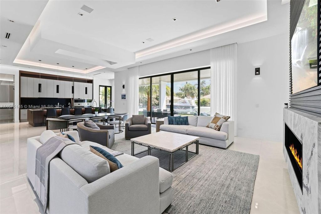 Experience luxury living at 749 Bamboo Drive. This 6 bed, 8 bath contemporary masterpiece offers 7,502 sqft of elegance, gourmet kitchen, private pool and ocean access in prestigious South Florida. Fully furnished.