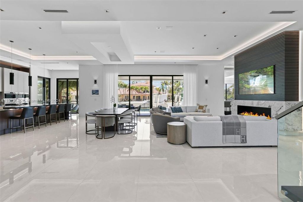 Experience luxury living at 749 Bamboo Drive. This 6 bed, 8 bath contemporary masterpiece offers 7,502 sqft of elegance, gourmet kitchen, private pool and ocean access in prestigious South Florida. Fully furnished.