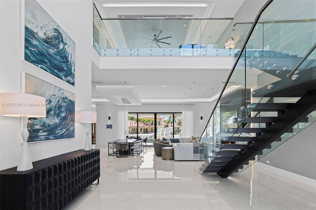 Experience luxury living at 749 Bamboo Drive. This 6 bed, 8 bath contemporary masterpiece offers 7,502 sqft of elegance, gourmet kitchen, private pool and ocean access in prestigious South Florida. Fully furnished.