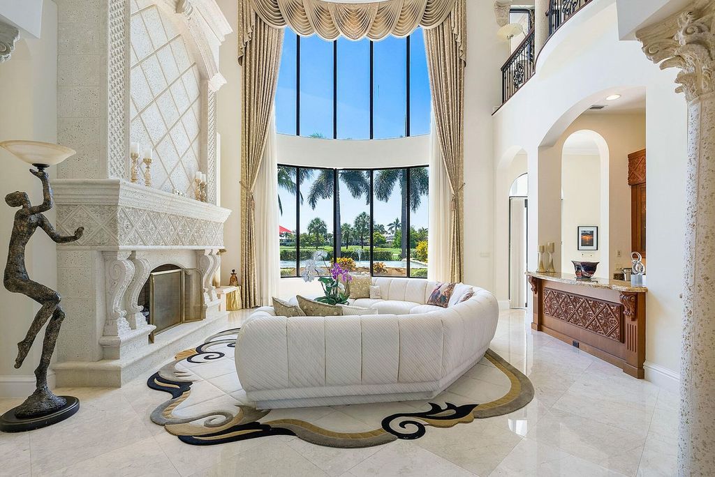 Boca Raton luxury awaits! Own a rare double-lot estate with pool, gourmet kitchen and dual master suites. Stunning golf course views in Royal Palm Yacht & Country Club.