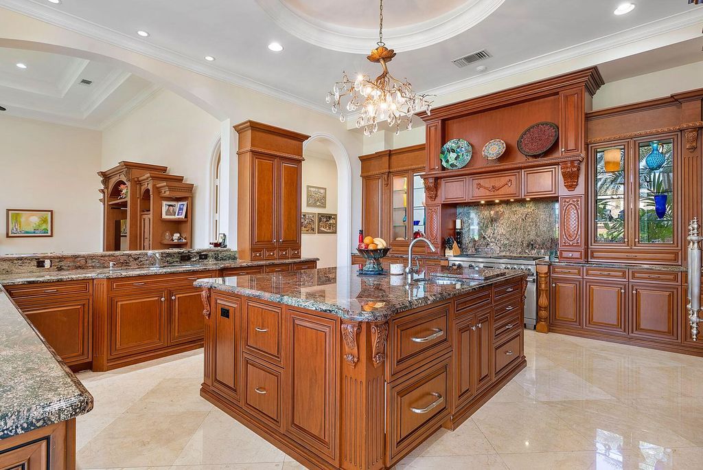 Boca Raton luxury awaits! Own a rare double-lot estate with pool, gourmet kitchen and dual master suites. Stunning golf course views in Royal Palm Yacht & Country Club.