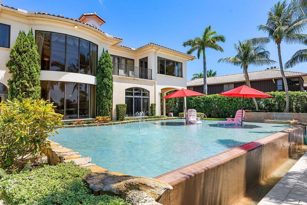 Boca Raton luxury awaits! Own a rare double-lot estate with pool, gourmet kitchen and dual master suites. Stunning golf course views in Royal Palm Yacht & Country Club.