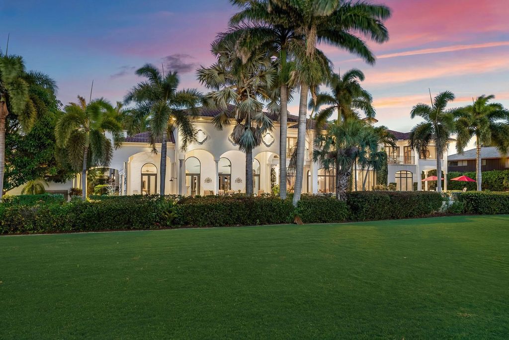 Boca Raton luxury awaits! Own a rare double-lot estate with pool, gourmet kitchen and dual master suites. Stunning golf course views in Royal Palm Yacht & Country Club.