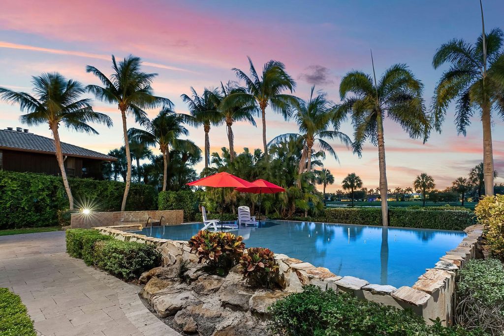 Boca Raton luxury awaits! Own a rare double-lot estate with pool, gourmet kitchen and dual master suites. Stunning golf course views in Royal Palm Yacht & Country Club.