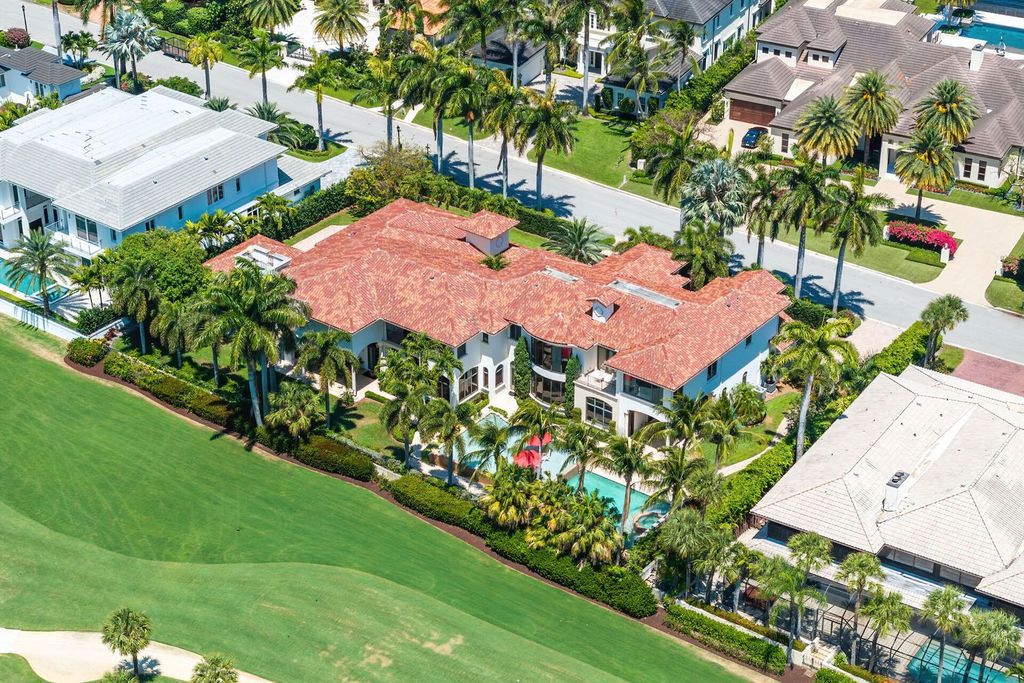 Boca Raton luxury awaits! Own a rare double-lot estate with pool, gourmet kitchen and dual master suites. Stunning golf course views in Royal Palm Yacht & Country Club.