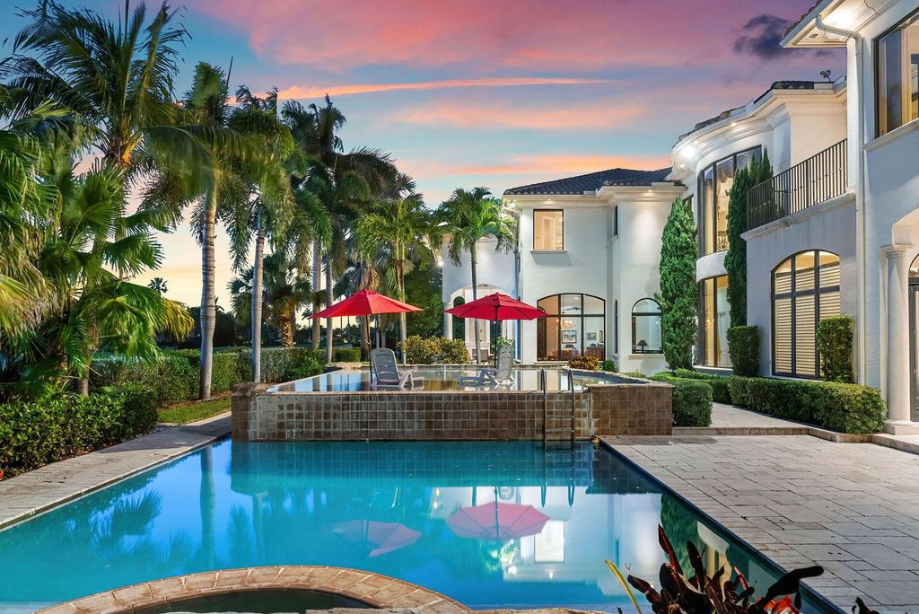 Boca Raton luxury awaits! Own a rare double-lot estate with pool, gourmet kitchen and dual master suites. Stunning golf course views in Royal Palm Yacht & Country Club.