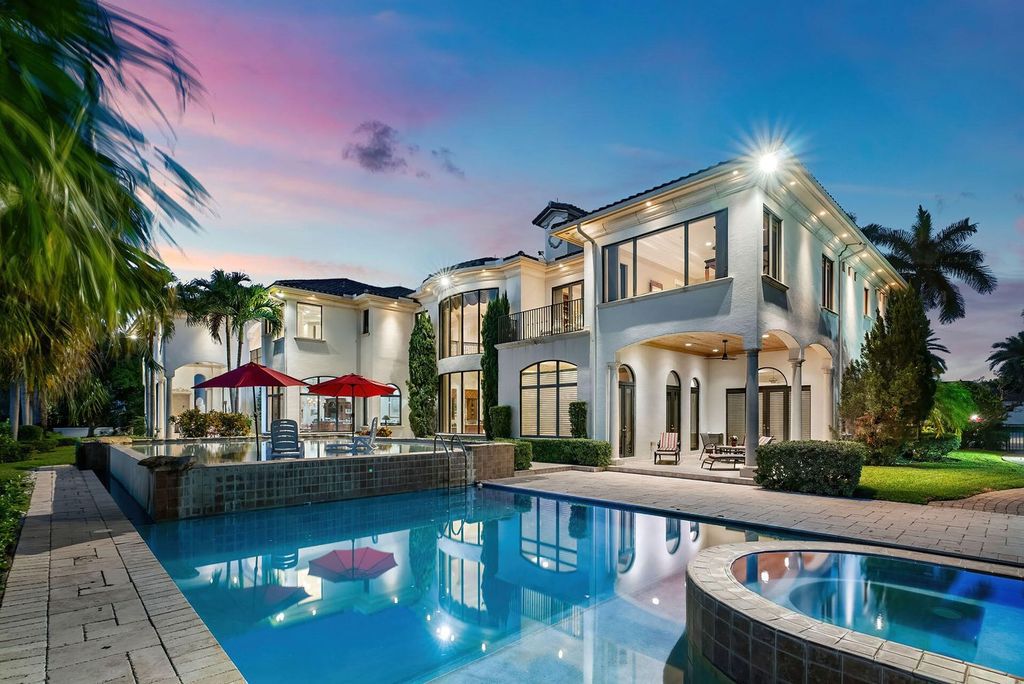 Boca Raton luxury awaits! Own a rare double-lot estate with pool, gourmet kitchen and dual master suites. Stunning golf course views in Royal Palm Yacht & Country Club.