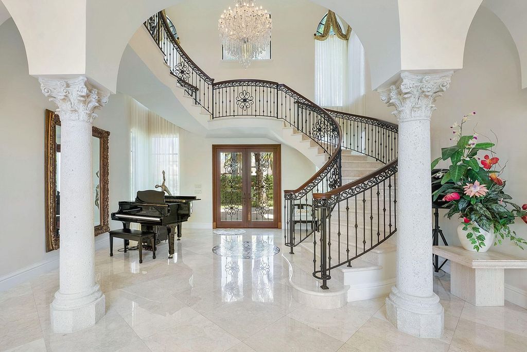 Boca Raton luxury awaits! Own a rare double-lot estate with pool, gourmet kitchen and dual master suites. Stunning golf course views in Royal Palm Yacht & Country Club.