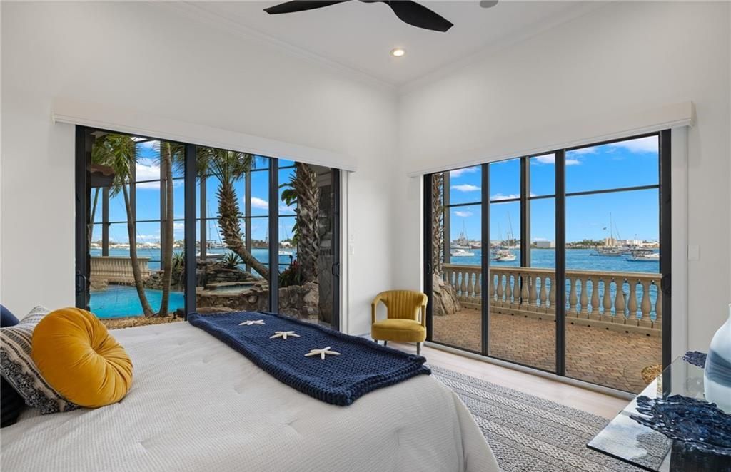 Boasting 180 feet of waterfront, a private dock, and an expansive pool area, this 4-bedroom haven offers endless opportunities for relaxation and adventure.