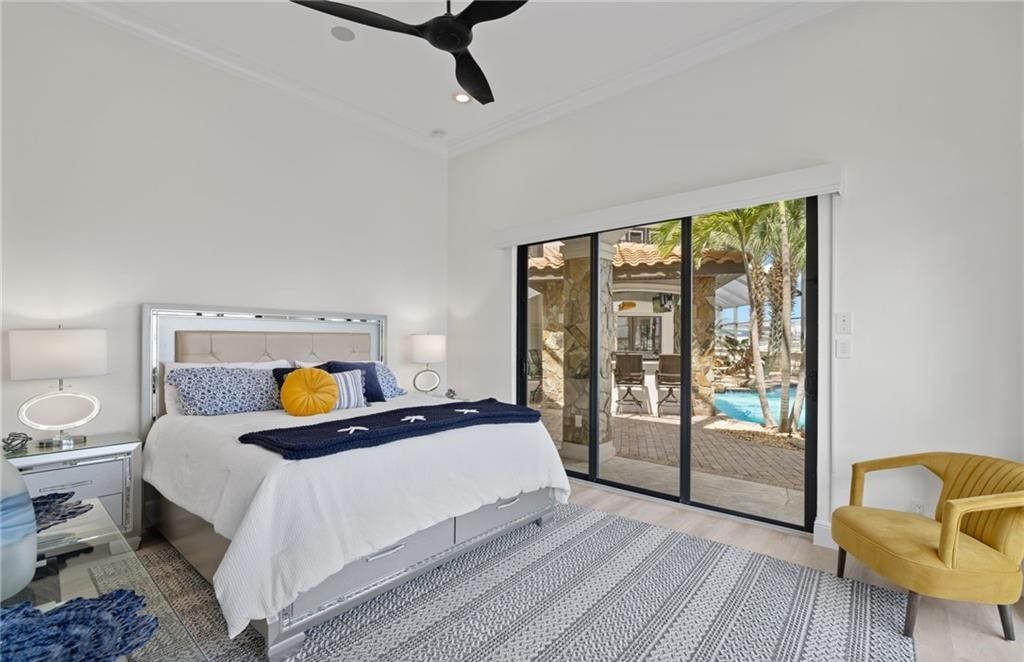 Boasting 180 feet of waterfront, a private dock, and an expansive pool area, this 4-bedroom haven offers endless opportunities for relaxation and adventure.