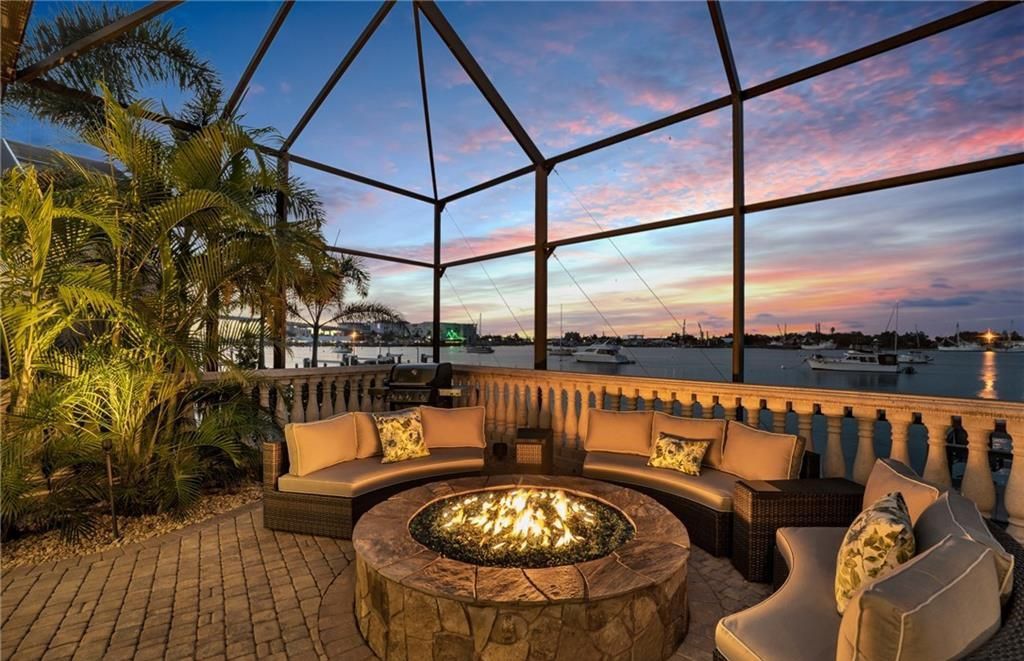 Boasting 180 feet of waterfront, a private dock, and an expansive pool area, this 4-bedroom haven offers endless opportunities for relaxation and adventure.