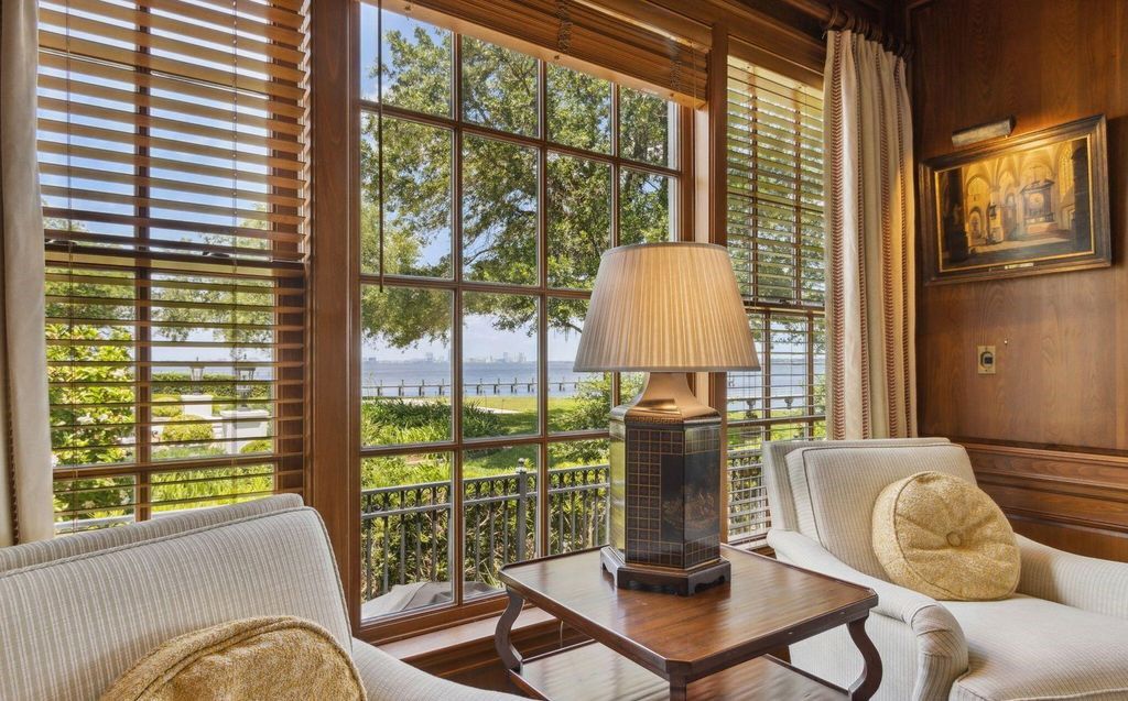 This 5-bedroom estate boasts breathtaking riverfront views, expansive grounds, and a floor plan designed for entertaining. Hardwood floors, fireplaces, and a gourmet kitchen create an unforgettable ambiance.