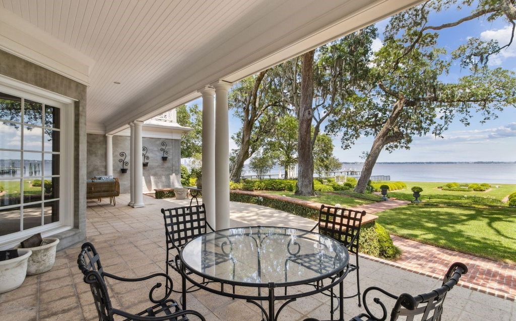 This 5-bedroom estate boasts breathtaking riverfront views, expansive grounds, and a floor plan designed for entertaining. Hardwood floors, fireplaces, and a gourmet kitchen create an unforgettable ambiance.