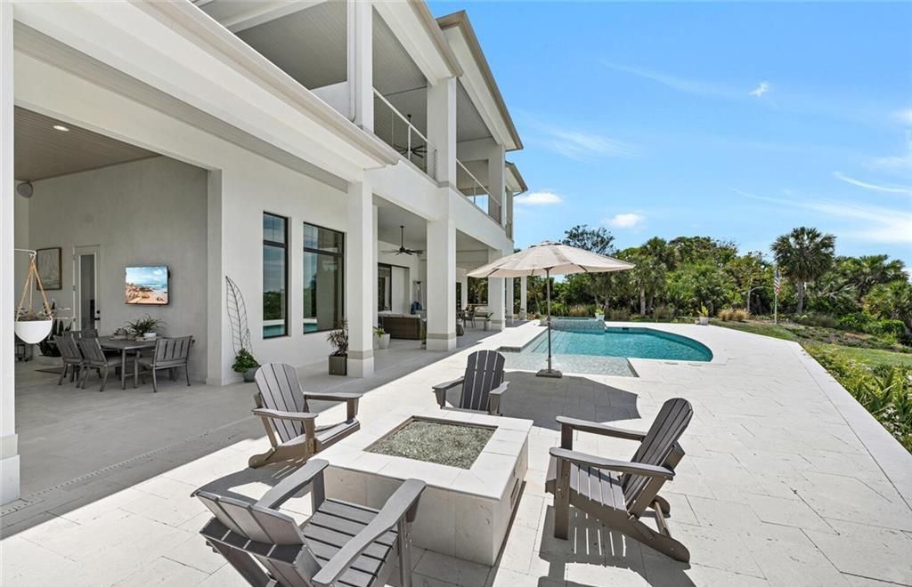 Unwind in paradise at this exquisite 12,000+ square feet estate on a private island in Marco Island. This boater's dream home boasts breathtaking water views, a gourmet kitchen, a wine cellar, a pool, and access to exclusive community amenities. Don't miss this rare opportunity!