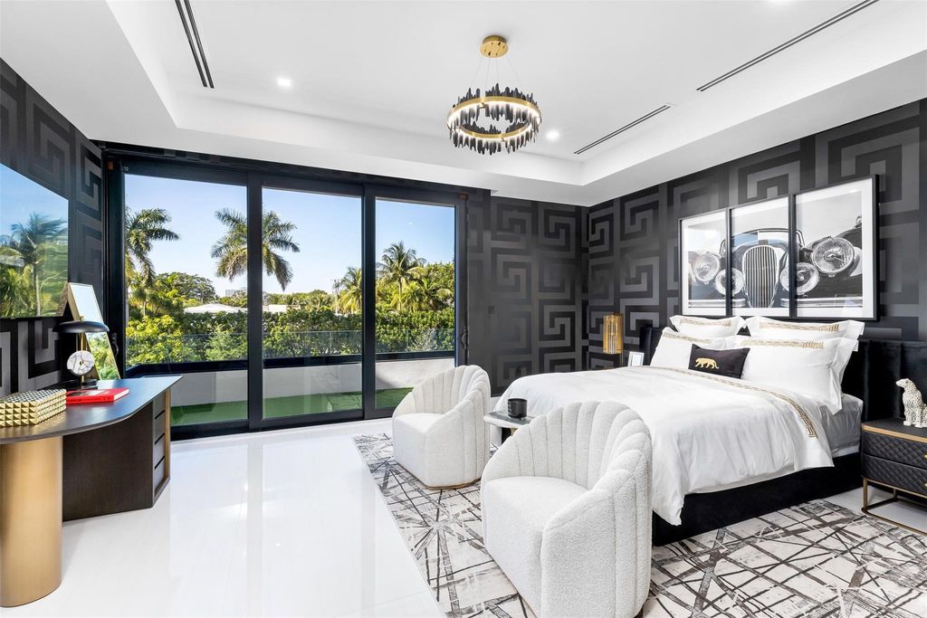 Unmatched Intracoastal views meet unparalleled luxury in this waterfront estate by the esteemed Crest Group and Bruce Celenski. Boasting a spa, media room, gourmet kitchens, smart home features, private dock, pool and rooftop deck, this residence redefines beachfront living.