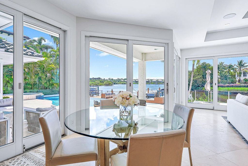 Immerse yourself in luxury living at this custom waterfront estate. Breathtaking water views, sunsets, and a private dock make this your dream home. Updated kitchen, spacious suites, and prime location near the Club. Schedule a showing today!