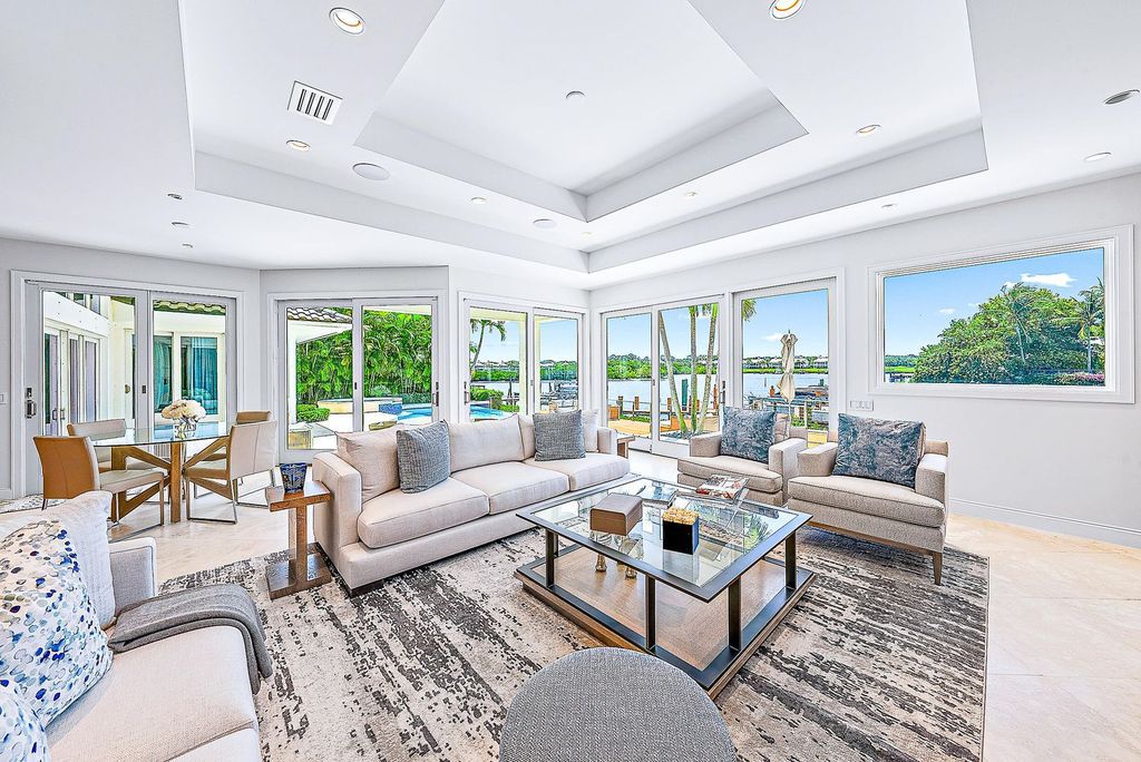 Immerse yourself in luxury living at this custom waterfront estate. Breathtaking water views, sunsets, and a private dock make this your dream home. Updated kitchen, spacious suites, and prime location near the Club. Schedule a showing today!