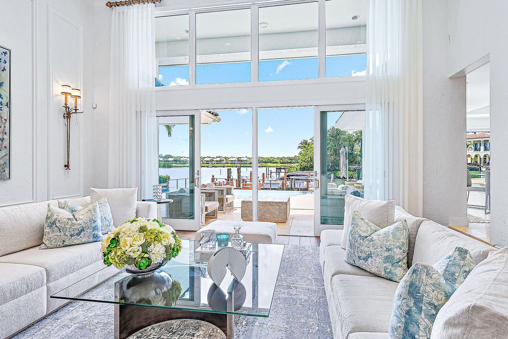 Immerse yourself in luxury living at this custom waterfront estate. Breathtaking water views, sunsets, and a private dock make this your dream home. Updated kitchen, spacious suites, and prime location near the Club. Schedule a showing today!