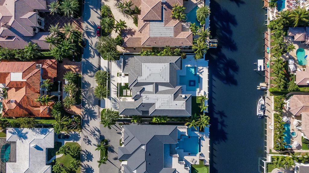 Experience unparalleled luxury at Villa Bianca, a contemporary jewel in Boca Raton's Royal Palm Yacht and Country Club. This 8,862 square feet waterfront estate boasts 6 bedrooms, 8 bathrooms, and an infinity-edge pool, offering the epitome of Italian design and craftsmanship.