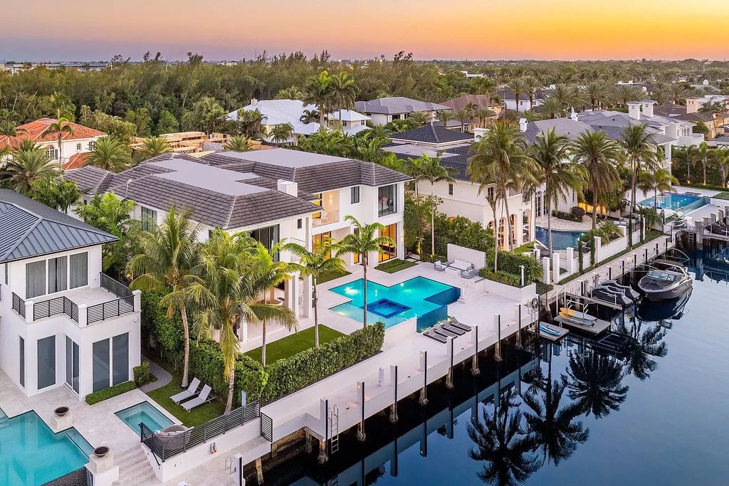 Experience unparalleled luxury at Villa Bianca, a contemporary jewel in Boca Raton's Royal Palm Yacht and Country Club. This 8,862 square feet waterfront estate boasts 6 bedrooms, 8 bathrooms, and an infinity-edge pool, offering the epitome of Italian design and craftsmanship.