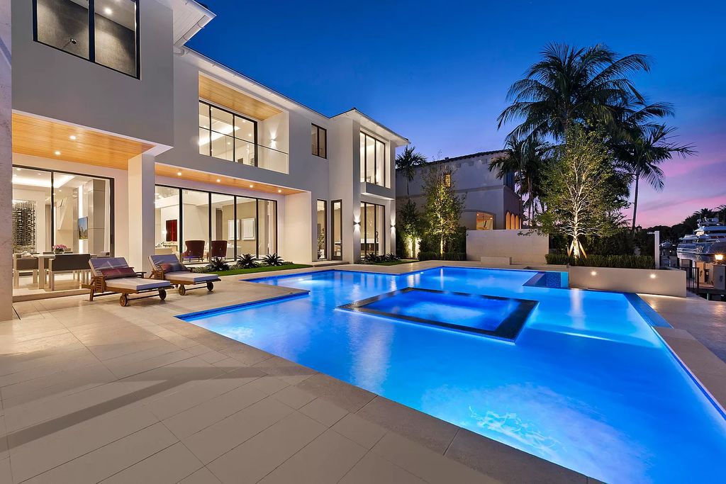 Experience unparalleled luxury at Villa Bianca, a contemporary jewel in Boca Raton's Royal Palm Yacht and Country Club. This 8,862 square feet waterfront estate boasts 6 bedrooms, 8 bathrooms, and an infinity-edge pool, offering the epitome of Italian design and craftsmanship.