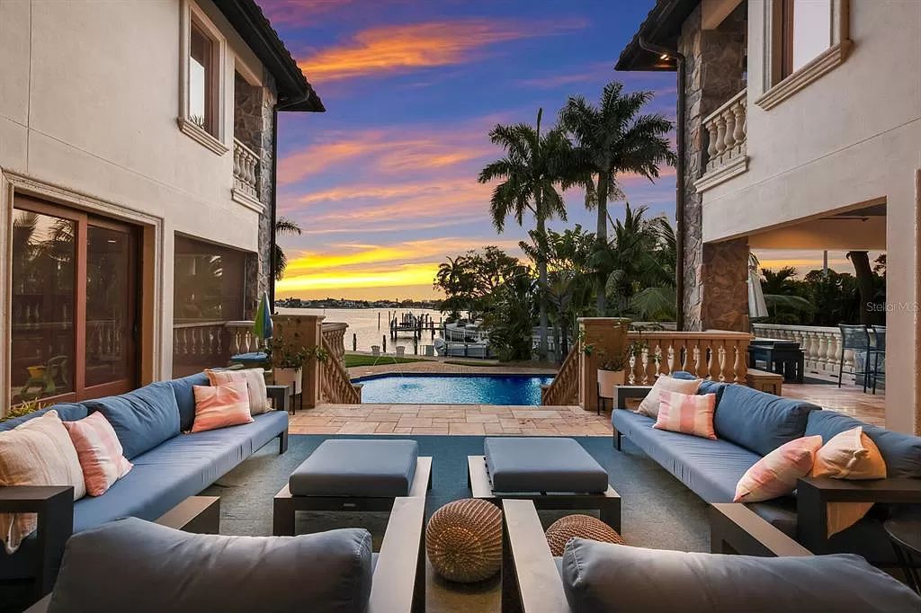 This 7,960 square feet waterfront mansion in San Remo Estates offers unparalleled luxury living. Imagine sprawling bay views, a sparkling pool with swim-up bar, gourmet kitchen, and multiple terraces for entertaining.