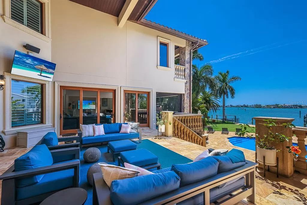 This 7,960 square feet waterfront mansion in San Remo Estates offers unparalleled luxury living. Imagine sprawling bay views, a sparkling pool with swim-up bar, gourmet kitchen, and multiple terraces for entertaining.