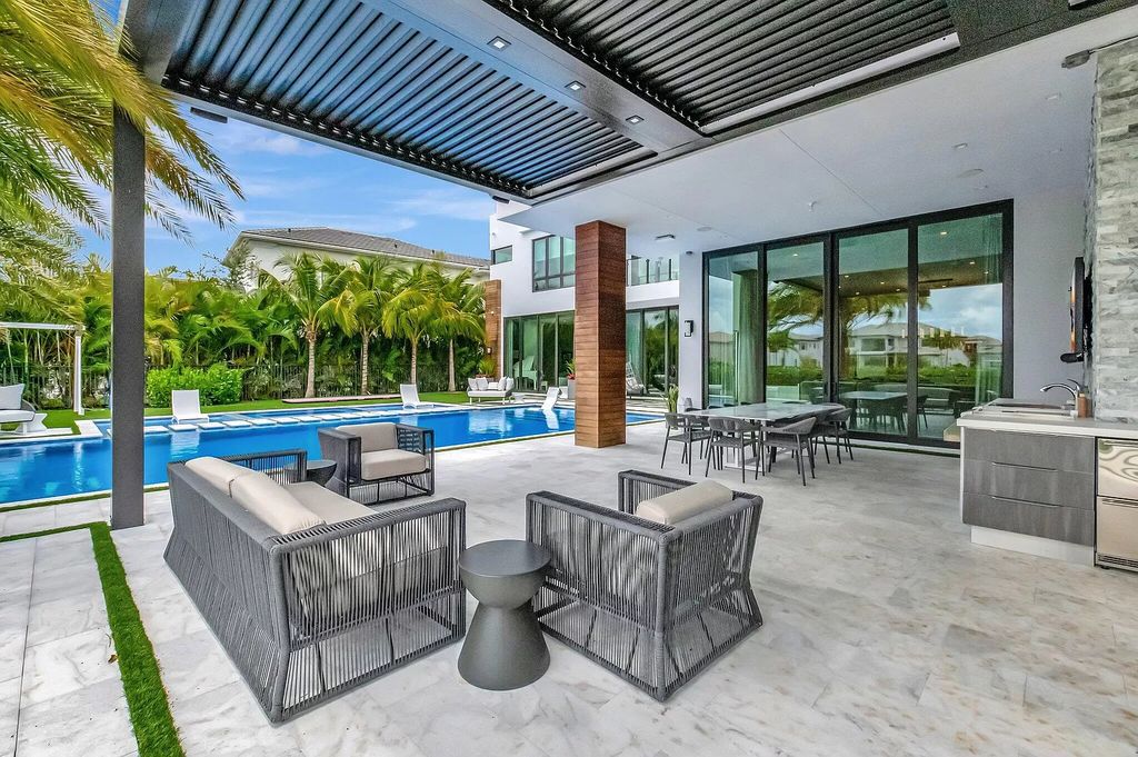 This 8,000 square feet masterpiece boasts 6 bedrooms, 7.5 baths, a waterfront location, a resort-style pool and spa, custom upgrades throughout, and breathtaking water views.