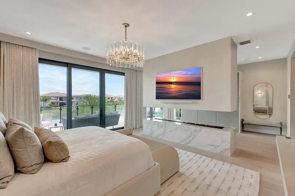 This 8,000 square feet masterpiece boasts 6 bedrooms, 7.5 baths, a waterfront location, a resort-style pool and spa, custom upgrades throughout, and breathtaking water views.