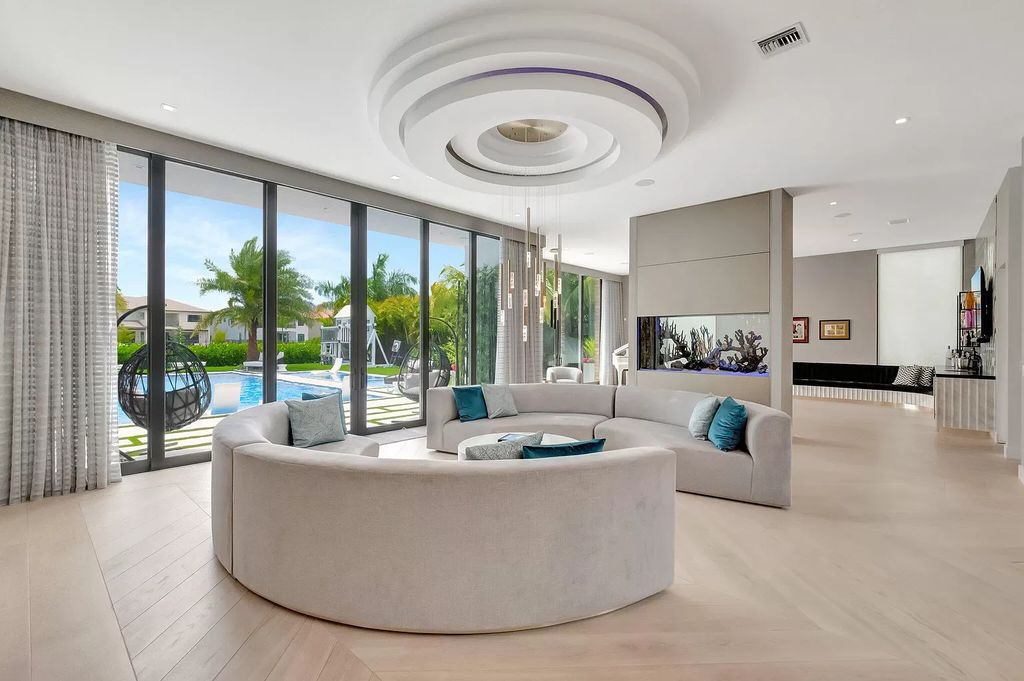 This 8,000 square feet masterpiece boasts 6 bedrooms, 7.5 baths, a waterfront location, a resort-style pool and spa, custom upgrades throughout, and breathtaking water views.