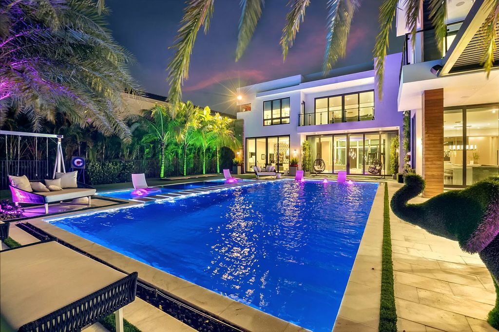 This 8,000 square feet masterpiece boasts 6 bedrooms, 7.5 baths, a waterfront location, a resort-style pool and spa, custom upgrades throughout, and breathtaking water views.