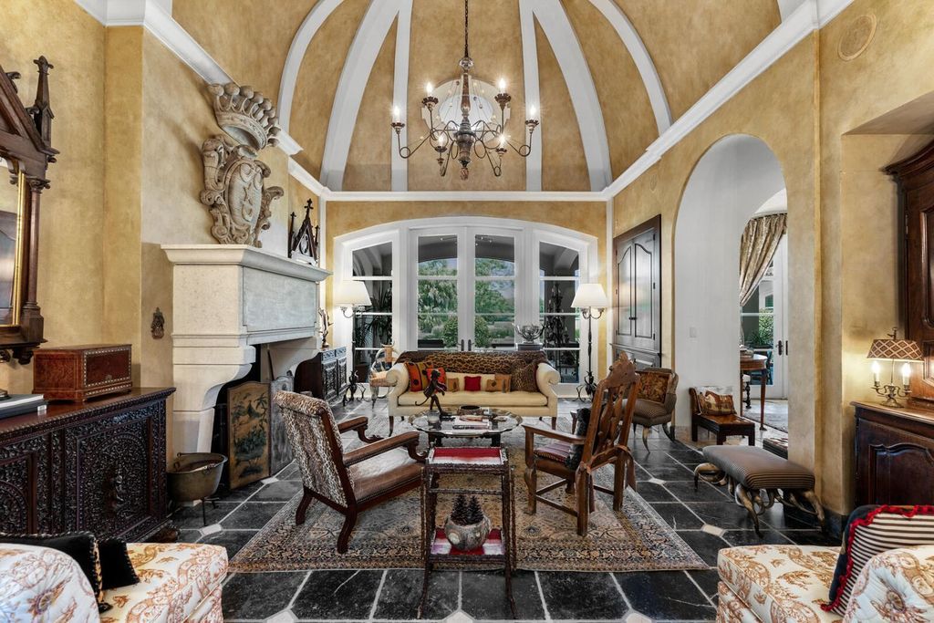 Live in Unrivaled Luxury! This 5-bedroom Bridle Path estate boasts an AIA-recognized octagonal turret, grand hall, chef's kitchen, screened loggia, pool, and lush landscaping. Move-in ready with new roof, generator, impact windows and more!