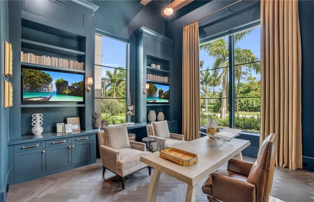 Built by Borelli Construction and designed by Carrie Brigham Design, this modern Tudor masterpiece boasts a chef's kitchen, expansive game room with wet bar, sparkling pool with pool house, private guest casita, resort-style lanai with fireplace, and top-of-the-line finishes throughout.