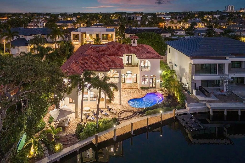 Discover an unparalleled lifestyle in this exquisite 6 bed, 7 bath Boca Raton estate. Nestled in the prestigious Golden Triangle, this waterfront property boasts breathtaking views, designer finishes, smart home technology, and deep water access. Indulge in world-class amenities, pristine beaches, and Mizner Park's vibrant atmosphere. This is Boca Raton living at its finest!