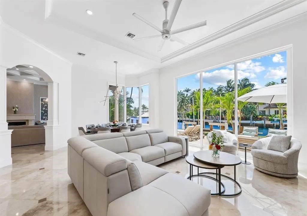 Don't miss this meticulously crafted 6 bed, 7.5 bath estate in Lighthouse Point! $2M in upgrades include a commercial bar, stunning movie theater, and a private oasis with a full-service dock. Your dream home awaits at 2520 NE 31st Ct.