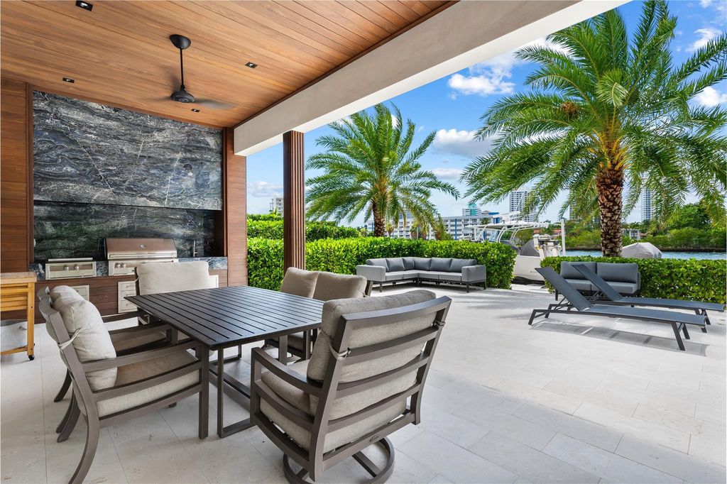 Live the resort life in this stunning single-level estate by Randall Stofft. 110' Intracoastal frontage, pool, spa, fire pit! European oak floors, 2-car garages, boat lift, and prime Sunrise location near beaches, shopping, and dining.