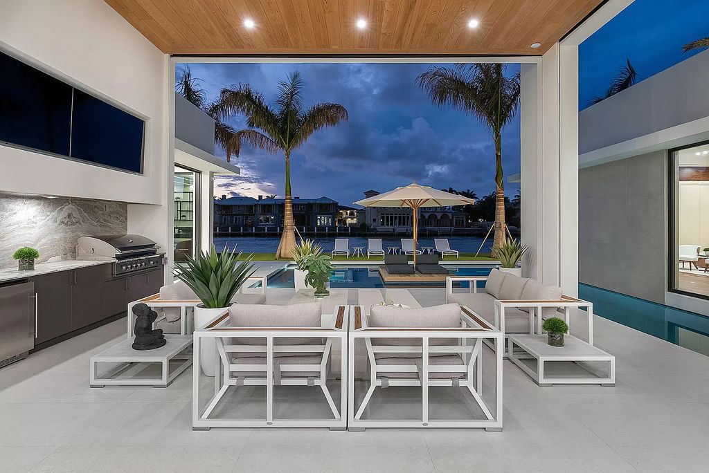 Experience Florida living at its finest in this modern, single-level Intracoastal home. 4 bedrooms, glass-enclosed office, club room, volume ceilings and private gated entrance. Priced to sell! BEST VALUE on the Intracoastal!