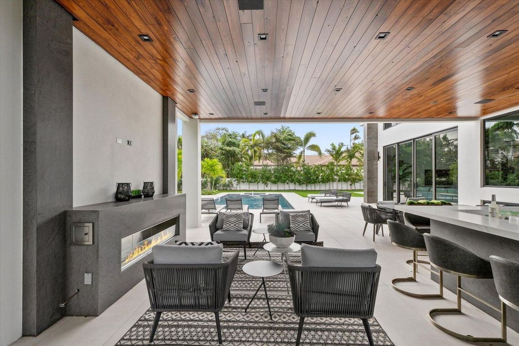 Immerse yourself in unparalleled luxury at 1120 Spanish River Rd, Boca Raton. This expansive 5-bedroom, 6.5-bathroom estate boasts 6,646 square feet of living space, a custom chef's kitchen, resort-style pool, and prime location. Priced at $7,998,000, this dream home is waiting for you.