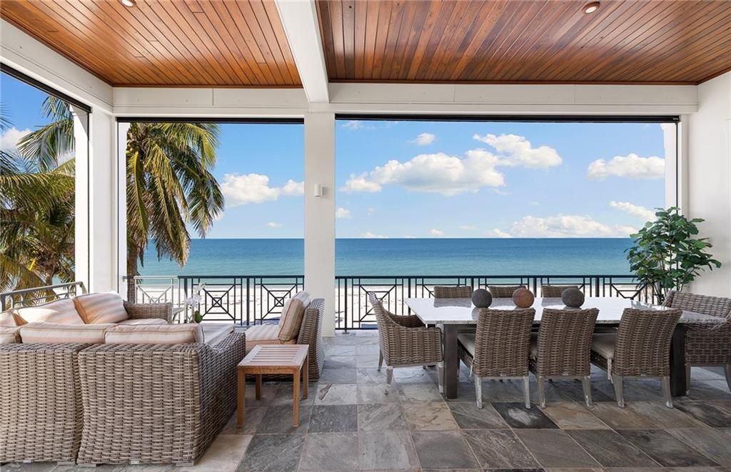 Immerse yourself in luxury living at this 7,490 sq ft beachfront estate. Custom-built with high-end finishes, this 4-bedroom home boasts a chef's kitchen, private pool, and expansive Gulf views. Perfect for entertaining, with private balconies and an open floor plan. Live the Barefoot Beach dream today!