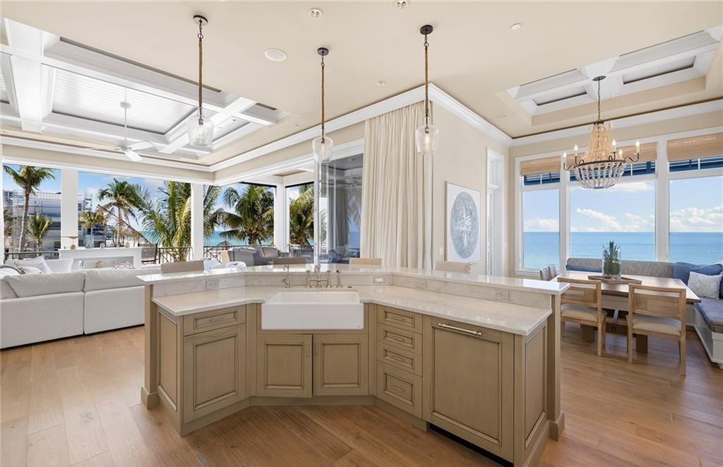 Immerse yourself in luxury living at this 7,490 sq ft beachfront estate. Custom-built with high-end finishes, this 4-bedroom home boasts a chef's kitchen, private pool, and expansive Gulf views. Perfect for entertaining, with private balconies and an open floor plan. Live the Barefoot Beach dream today!